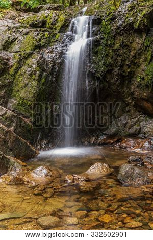 Majestic waterfall in Nakusp, Vancouver, Canada.