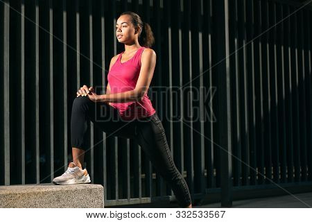 Confident Athlete Training Outside And Looking Calm Stock Photo