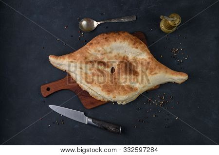 Georgian Bread Lavash On Wooden Board On Dark Rustic Background, Top View