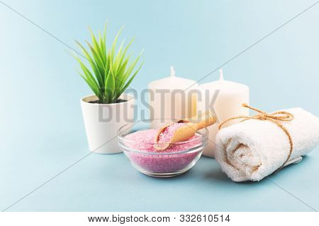 Beauty Composition With Pink Salt And Towel On Blue Background. Selfcare, Home Spa And Relaxation Co