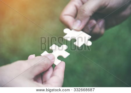 Stakeholders Business Team Holding Jigsaw Puzzle As A Team Building And Organization Connection Symb