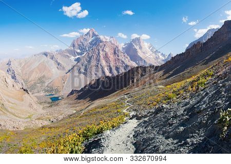 Hiking In Mountain Trail. Beautiful Mountains Landscape. Fann Mountains In Tajikistan. Scenic Wild H