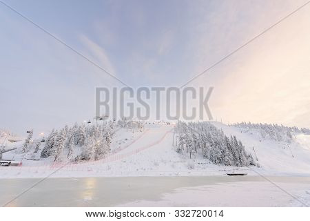 Rukatunturi Ski Jumping Hill In Winter Season And Nice Weather And Blue Sky In Winter Season And Sun
