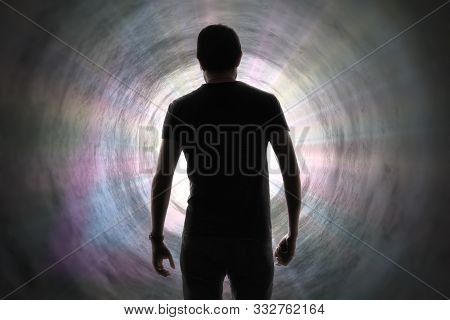 Silhouette Of Man's Soul Is Going To Bright Light - Rays Of God