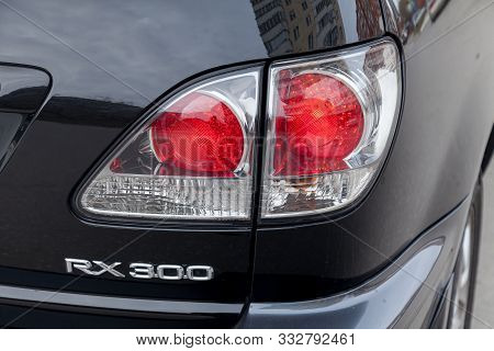 Novosibirsk, Russia - 11.05.2019: Black Toyota Harrier Or Lexus Rx300 1997 Year Rear Taillamp View W
