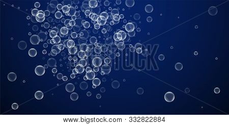 Random Soap Bubbles Abstract Background. Blowing Bubbles On Winter Sky Background. Artistic Soapy Fo