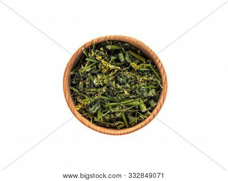 Dry Melilotus In Wooden Cup On White Background.