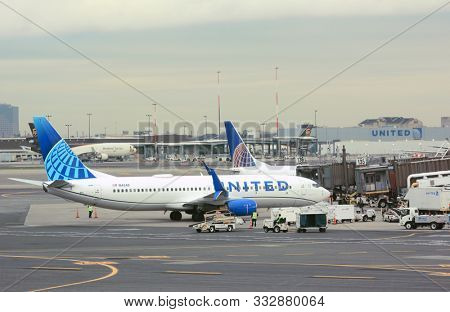 NEWARK, NEW JERSEY - 05 NOV 2019: United Airlines 737 airplane on the tarmac approaching its gate at Newark Liberty International Airport (EWR).