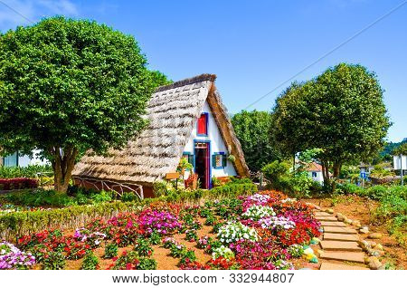 Amazing Traditional Houses In Santana, Madeira, Portugal. Wooden, Triangular Houses Represent A Part