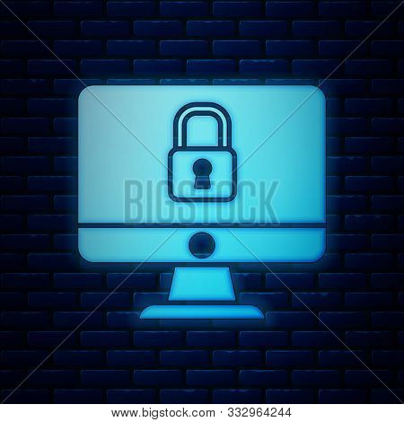 Glowing Neon Lock On Computer Monitor Screen Icon Isolated On Brick Wall Background. Security, Safet