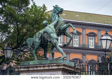 Clodt Horses Sculpture In Front Of The Garden Of Royal Palace In Naples, Italy