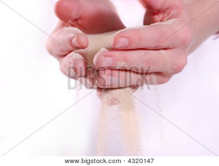 Woman Hand Holding Sand