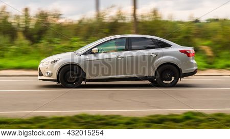 Moscow, Russia - August 2021: Silver Car Ford Focus Sedan Mk Iii Fast Speed Driving On The Country R