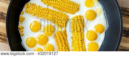 Top Above View Of Many Tasty Healthy Small Chicken Quial Eggs With Boiled Corn Slice Fried On Pan. B