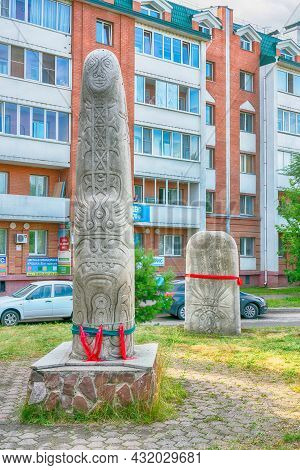 Abakan, Russia 07.27.2021: A Monument In The Form Of A Ritual Pillar Of Oriental Shamans