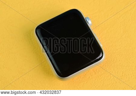 Klang, Malaysia: September 6, 2021- Apple Watch Screen Isolated On A Yellow Background