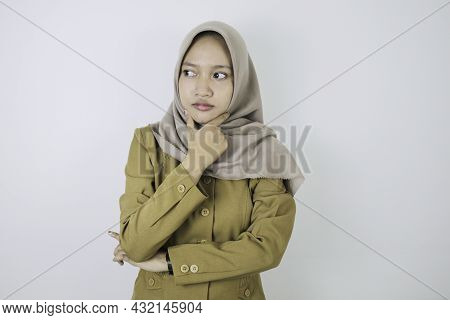 Confused Government Worker Women Have Thinking Gesture. Pns Wearing Khaki Uniform.