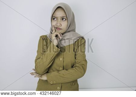 Confused Government Worker Women Have Thinking Gesture. Pns Wearing Khaki Uniform.
