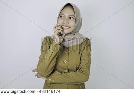 Happy Government Worker Women Have Thinking Gesture. Pns Wearing Khaki Uniform.