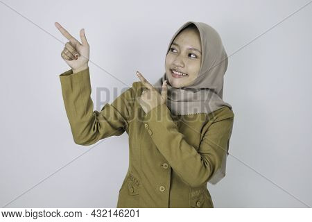 Smile Government Worker Women Pointing Beside. Pns Wearing Khaki Uniform.