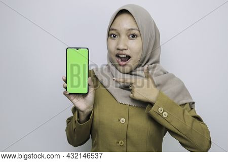 Shock Government Worker Women Showing Blank Screen On Smartphone. Pns Wearing Khaki Uniform.