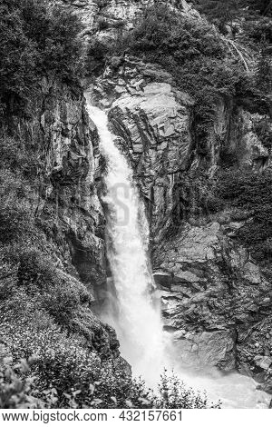 Wild Alpine Waterfall On Schlatenbach Mountain Stream. Gschloesstal Valley, Hohe Tauern National Par
