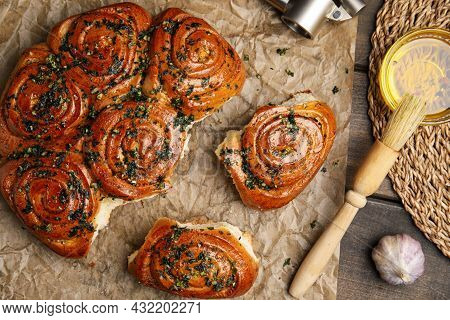 Traditional Ukrainian Bread (pampushky) With Garlic  On Wooden Table, Flat Lay