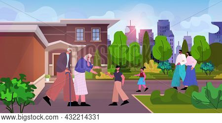 Happy Grandparents Walking Outdoor With Grandchildren Multi Generation Family Spending Time Together
