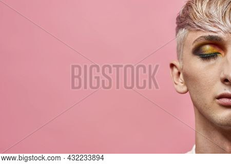 Half Face Closeup Of Young Transgender With Bright Dark Night Party Makeup On Posing With Eyes Close