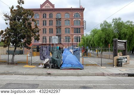 LOS ANGELES, CALIFORNIA, 18 AUG 2021: Homeless tent at the Old City Plaza at Arcadia and Main Streets.