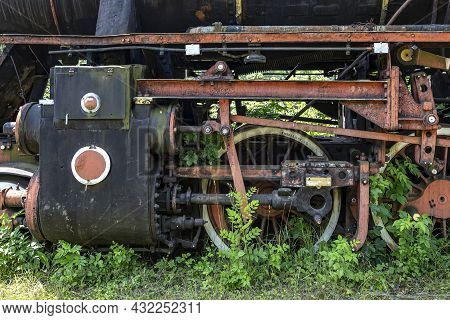Steam Engine Of The Old Locomotive Paited In Red And Black