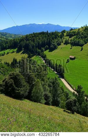  Summer landscape in the Carpathians, Pestera Village, Romania, Europe                            