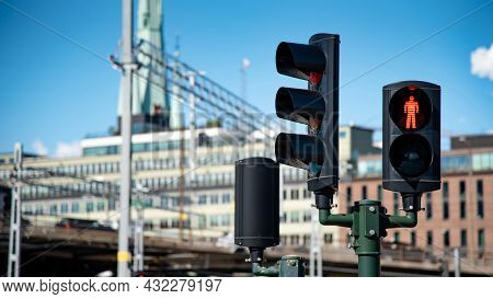 Pedestrian Traffic Light With Red Man Led Symbol Which Means Don't Walk Across The Road. Traffic Lig