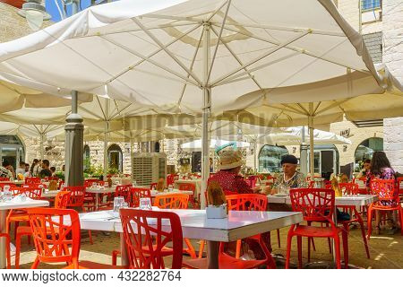 Jerusalem, Israel - August 30, 2021: Cafe Scene Of The Music Square, With Visitors, In The Nahalat S