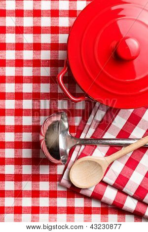 the kitchenware on checkerd tablecloth