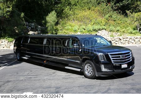 August 27, 2021 San Pedro California: 18 Passenger Limousine. Extra Long 18 - 24 Passenger Limo arrives at a Wedding Location. 