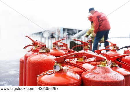 Fire Safety Training Using Fire Extinguishers. Foreground. Real Event.