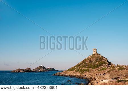 The Genoese Tower And Lighthouse At Pointe De La Parata And Les Iles Sanguinaires Near Ajaccio In Co