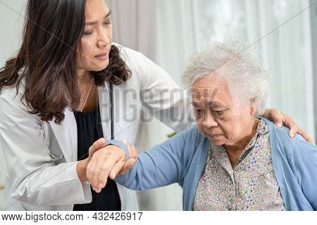 Help And Care Asian Senior Or Elderly Old Lady Woman Patient Sitting On Wheelchair At Nursing Hospit