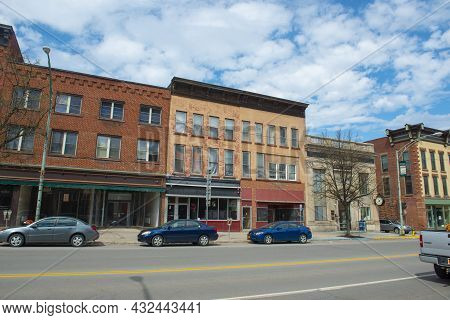 Potsdam, Ny, Usa - Apr. 27, 2017: Historic Sandstone And Brick Commercial Buildings With Italianate 