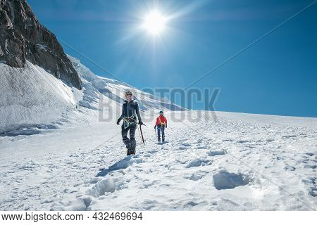 Two Laughing Young Women Rope Team Descending Mont Blanc Du Tacul Summit 4248m Dressed Mountaineerin