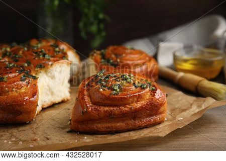 Traditional Ukrainian Bread (pampushky) With Garlic On Wooden Table