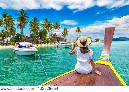 Happy Traveler Woman Relaxing On Boat Near Tropical Island In Thailand
