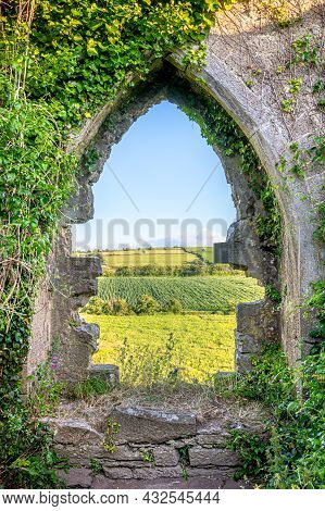 Window Of The Ruins Of Kilcrea Castle Looking Out Onto The Irish Countryside