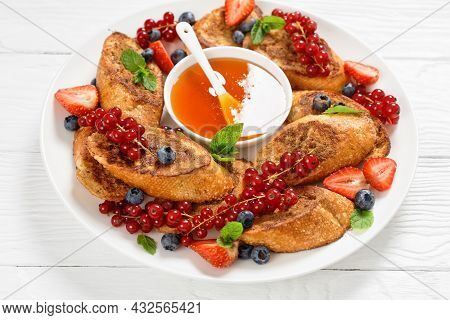Wentelteefjes, Dutch Breakfast Of Crispy Sweet French Toasts Sprinkled With Cinnamon And Fresh Straw