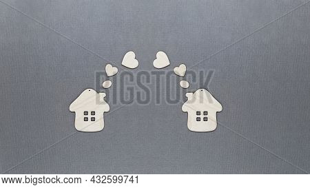 Toy Wooden Houses With Hearts Flying Out Of The Pipes. The Concept Of The World Of Love And Good Nei
