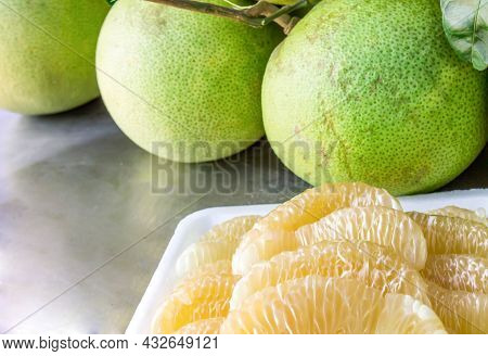 Close Up Many Pomelo Peeled And Pomelo On The Table A Fruit From Asia With A Sweet And Sour Taste