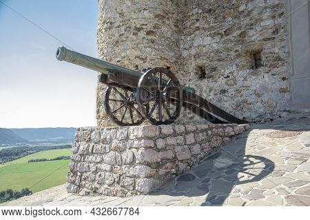 Bronze Cannon In Front Of Krasna Horka Castle. Slovakia.