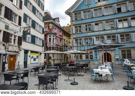 Switzerland, Zurich, August, 2021 - Square Munsterhof With Open Terrace Restaurants In Old Historica