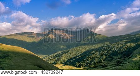 Mountains Of North Ossetia, Beautiful Summer Landscapes With Blue Sky And Clouds.